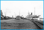 Stockholm - Nyns Jrnvg, Nynshamns ngbtsstation 1936. Omstigning mellan bt och tg. Persontget dras av nglok SNJ nummer 6 och fartyget r M/S Gotland frn Visby